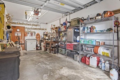 Don't miss this 1st floor unit on the 3rd hole of Gator Trace on Gator Trace Golf and Country Club in Florida - for sale on GolfHomes.com, golf home, golf lot