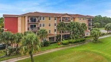 Don't miss this 1st floor unit on the 3rd hole of Gator Trace on Gator Trace Golf and Country Club in Florida - for sale on GolfHomes.com, golf home, golf lot
