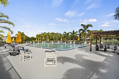 Don't miss this 1st floor unit on the 3rd hole of Gator Trace on Gator Trace Golf and Country Club in Florida - for sale on GolfHomes.com, golf home, golf lot