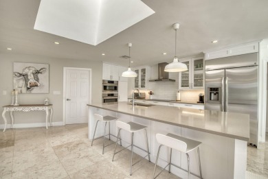 Step into recently renovated and impeccably designed 4-bedroom on PGA National Golf Club in Florida - for sale on GolfHomes.com, golf home, golf lot