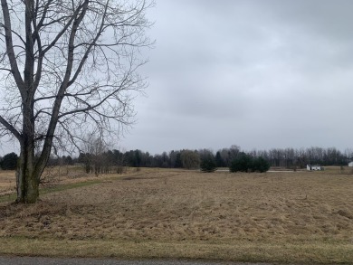 A beautiful building site overlooking the 7th hole and pond of on Eagle Glen Golf Course in Michigan - for sale on GolfHomes.com, golf home, golf lot