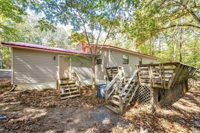 This home is rented and can't be shown until mid november.  This on Mountain Ranch Golf Club in Arkansas - for sale on GolfHomes.com, golf home, golf lot