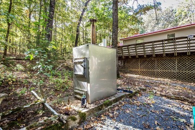 This home is rented and can't be shown until mid november.  This on Mountain Ranch Golf Club in Arkansas - for sale on GolfHomes.com, golf home, golf lot