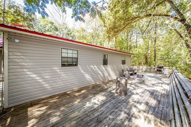 This home is rented and can't be shown until mid november.  This on Mountain Ranch Golf Club in Arkansas - for sale on GolfHomes.com, golf home, golf lot