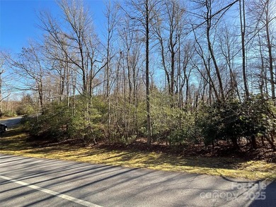 Corner lot bordering POA land. Spacious and buildable. Has on Connestee Falls Golf Club in North Carolina - for sale on GolfHomes.com, golf home, golf lot