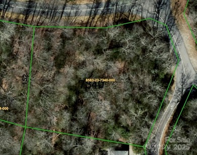 Corner lot bordering POA land. Spacious and buildable. Has on Connestee Falls Golf Club in North Carolina - for sale on GolfHomes.com, golf home, golf lot