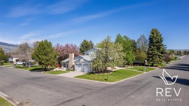 Discover comfort and convenience in this 4 bedroom, 3 bath home on Olive Glenn Golf and Country Club in Wyoming - for sale on GolfHomes.com, golf home, golf lot