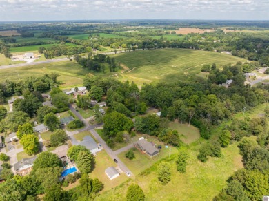 This recently updated home is ideally located just a short drive on Mayfield-Graves Country Club in Kentucky - for sale on GolfHomes.com, golf home, golf lot