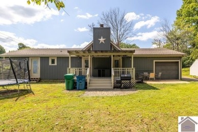 This recently updated home is ideally located just a short drive on Mayfield-Graves Country Club in Kentucky - for sale on GolfHomes.com, golf home, golf lot