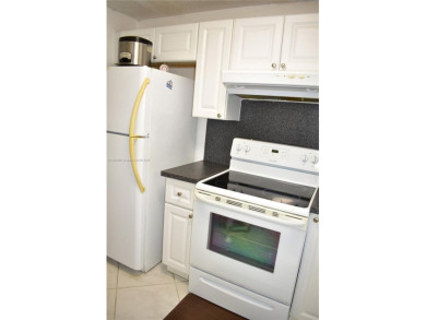This is a well located ground floor unit with all tile floors, a on  in Florida - for sale on GolfHomes.com, golf home, golf lot