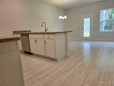 THE Palms Townhouse - Located in the Premier Gated, Lakeside on Inverness Golf and Country Club in Florida - for sale on GolfHomes.com, golf home, golf lot