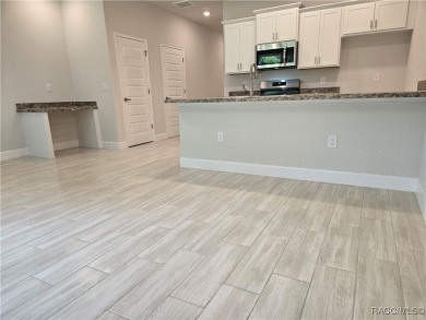 THE Palms Townhouse - Located in the Premier Gated, Lakeside on Inverness Golf and Country Club in Florida - for sale on GolfHomes.com, golf home, golf lot