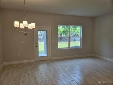 THE Palms Townhouse - Located in the Premier Gated, Lakeside on Inverness Golf and Country Club in Florida - for sale on GolfHomes.com, golf home, golf lot