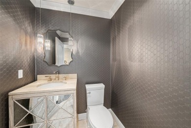 Welcome to this exquisitely appointed residence nestled within on TPC of Tampa Bay in Florida - for sale on GolfHomes.com, golf home, golf lot