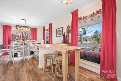 Discover your dream WATERFRONT contemporary home in the heart of on Tega Cay Golf Club in South Carolina - for sale on GolfHomes.com, golf home, golf lot