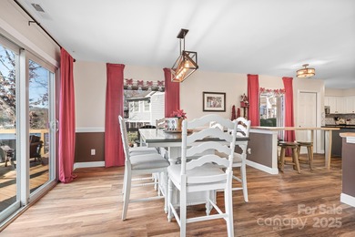 Discover your dream WATERFRONT contemporary home in the heart of on Tega Cay Golf Club in South Carolina - for sale on GolfHomes.com, golf home, golf lot