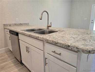 THE PALMS TOWNHOUSE - Located in the * Premier Gated, Lakeside on Inverness Golf and Country Club in Florida - for sale on GolfHomes.com, golf home, golf lot