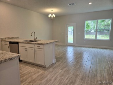 THE PALMS TOWNHOUSE - Located in the * Premier Gated, Lakeside on Inverness Golf and Country Club in Florida - for sale on GolfHomes.com, golf home, golf lot