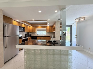 Discover coastal living at its best in this 2-bedroom on  in Florida - for sale on GolfHomes.com, golf home, golf lot