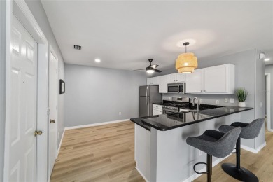 Step into this beautifully upgraded Colony Patio Villa, where on The Links of Spruce Creek in Florida - for sale on GolfHomes.com, golf home, golf lot
