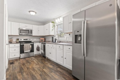 Fall in love with this updated 3 bedroom, 2 bathroom ranch home on Eagle Nest Golf Club in South Carolina - for sale on GolfHomes.com, golf home, golf lot