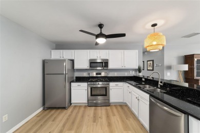 Step into this beautifully upgraded Colony Patio Villa, where on The Links of Spruce Creek in Florida - for sale on GolfHomes.com, golf home, golf lot