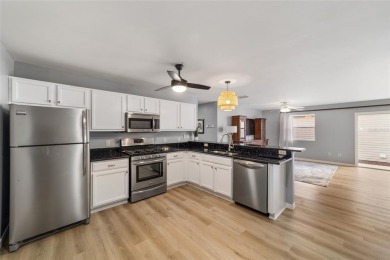 Step into this beautifully upgraded Colony Patio Villa, where on The Links of Spruce Creek in Florida - for sale on GolfHomes.com, golf home, golf lot