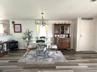 THIS 2-BEDROOM, 2-BATHROOM HOME HAS BEEN BEAUTIFULLY UPDATED AND on Anglers Green Golf Course in Florida - for sale on GolfHomes.com, golf home, golf lot