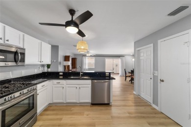 Step into this beautifully upgraded Colony Patio Villa, where on The Links of Spruce Creek in Florida - for sale on GolfHomes.com, golf home, golf lot
