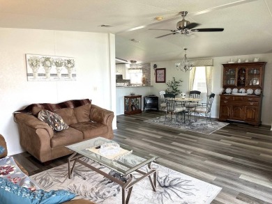 THIS 2-BEDROOM, 2-BATHROOM HOME HAS BEEN BEAUTIFULLY UPDATED AND on Anglers Green Golf Course in Florida - for sale on GolfHomes.com, golf home, golf lot