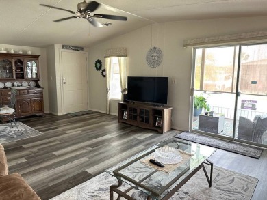 THIS 2-BEDROOM, 2-BATHROOM HOME HAS BEEN BEAUTIFULLY UPDATED AND on Anglers Green Golf Course in Florida - for sale on GolfHomes.com, golf home, golf lot