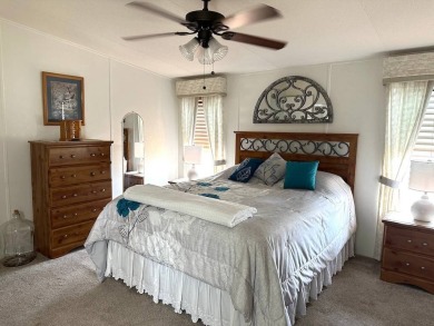 THIS 2-BEDROOM, 2-BATHROOM HOME HAS BEEN BEAUTIFULLY UPDATED AND on Anglers Green Golf Course in Florida - for sale on GolfHomes.com, golf home, golf lot