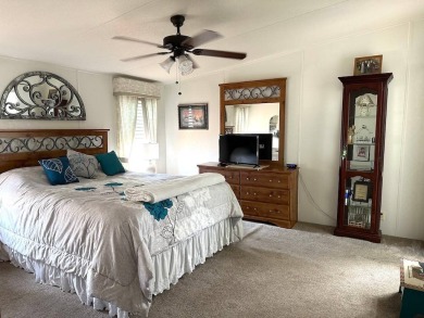 THIS 2-BEDROOM, 2-BATHROOM HOME HAS BEEN BEAUTIFULLY UPDATED AND on Anglers Green Golf Course in Florida - for sale on GolfHomes.com, golf home, golf lot