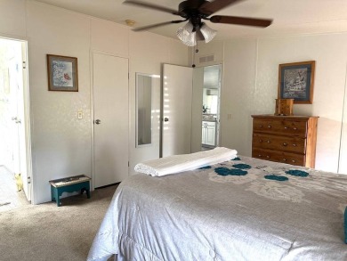 THIS 2-BEDROOM, 2-BATHROOM HOME HAS BEEN BEAUTIFULLY UPDATED AND on Anglers Green Golf Course in Florida - for sale on GolfHomes.com, golf home, golf lot