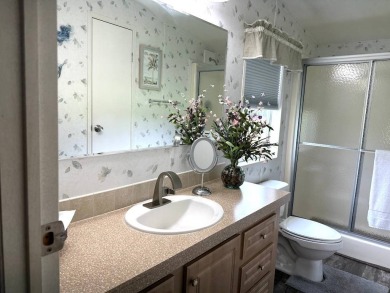 THIS 2-BEDROOM, 2-BATHROOM HOME HAS BEEN BEAUTIFULLY UPDATED AND on Anglers Green Golf Course in Florida - for sale on GolfHomes.com, golf home, golf lot