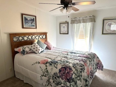 THIS 2-BEDROOM, 2-BATHROOM HOME HAS BEEN BEAUTIFULLY UPDATED AND on Anglers Green Golf Course in Florida - for sale on GolfHomes.com, golf home, golf lot