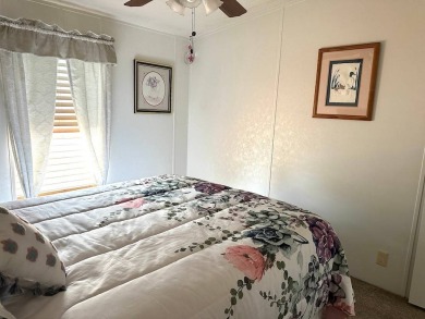 THIS 2-BEDROOM, 2-BATHROOM HOME HAS BEEN BEAUTIFULLY UPDATED AND on Anglers Green Golf Course in Florida - for sale on GolfHomes.com, golf home, golf lot