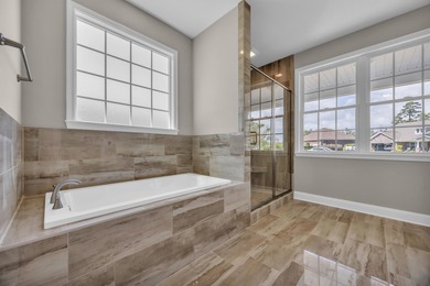 This brand-new, all-brick beauty delivers standout design on Long Bay Club in South Carolina - for sale on GolfHomes.com, golf home, golf lot