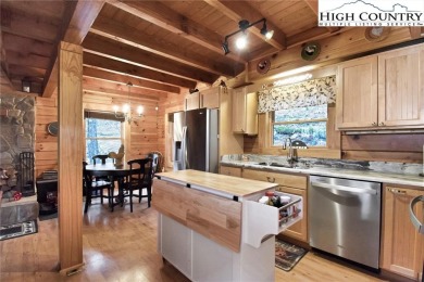 What everyone dreams of!  A log cabin on a mountain.  This one on Beech Mountain Club in North Carolina - for sale on GolfHomes.com, golf home, golf lot