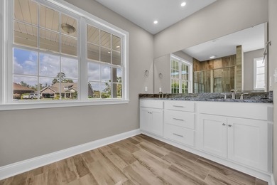 This brand-new, all-brick beauty delivers standout design on Long Bay Club in South Carolina - for sale on GolfHomes.com, golf home, golf lot