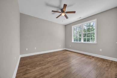 This brand-new, all-brick beauty delivers standout design on Long Bay Club in South Carolina - for sale on GolfHomes.com, golf home, golf lot