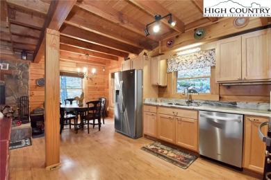 What everyone dreams of!  A log cabin on a mountain.  This one on Beech Mountain Club in North Carolina - for sale on GolfHomes.com, golf home, golf lot