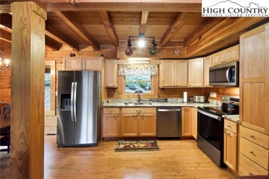 What everyone dreams of!  A log cabin on a mountain.  This one on Beech Mountain Club in North Carolina - for sale on GolfHomes.com, golf home, golf lot