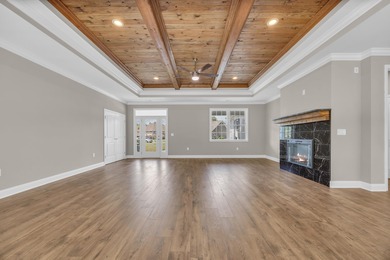 This brand-new, all-brick beauty delivers standout design on Long Bay Club in South Carolina - for sale on GolfHomes.com, golf home, golf lot