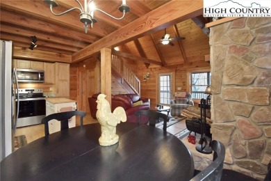 What everyone dreams of!  A log cabin on a mountain.  This one on Beech Mountain Club in North Carolina - for sale on GolfHomes.com, golf home, golf lot