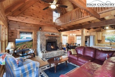 What everyone dreams of!  A log cabin on a mountain.  This one on Beech Mountain Club in North Carolina - for sale on GolfHomes.com, golf home, golf lot