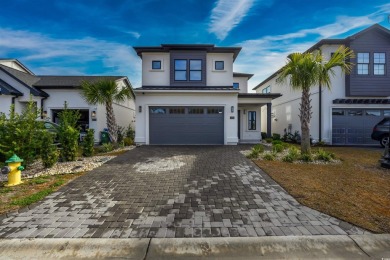 Nestled in a serene gated community with breathtaking views of a on Cane Patch Driving Range in South Carolina - for sale on GolfHomes.com, golf home, golf lot