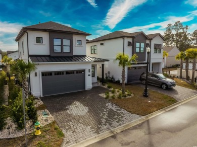 Nestled in a serene gated community with breathtaking views of a on Cane Patch Driving Range in South Carolina - for sale on GolfHomes.com, golf home, golf lot