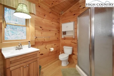 What everyone dreams of!  A log cabin on a mountain.  This one on Beech Mountain Club in North Carolina - for sale on GolfHomes.com, golf home, golf lot