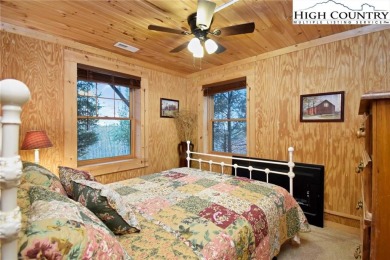 What everyone dreams of!  A log cabin on a mountain.  This one on Beech Mountain Club in North Carolina - for sale on GolfHomes.com, golf home, golf lot